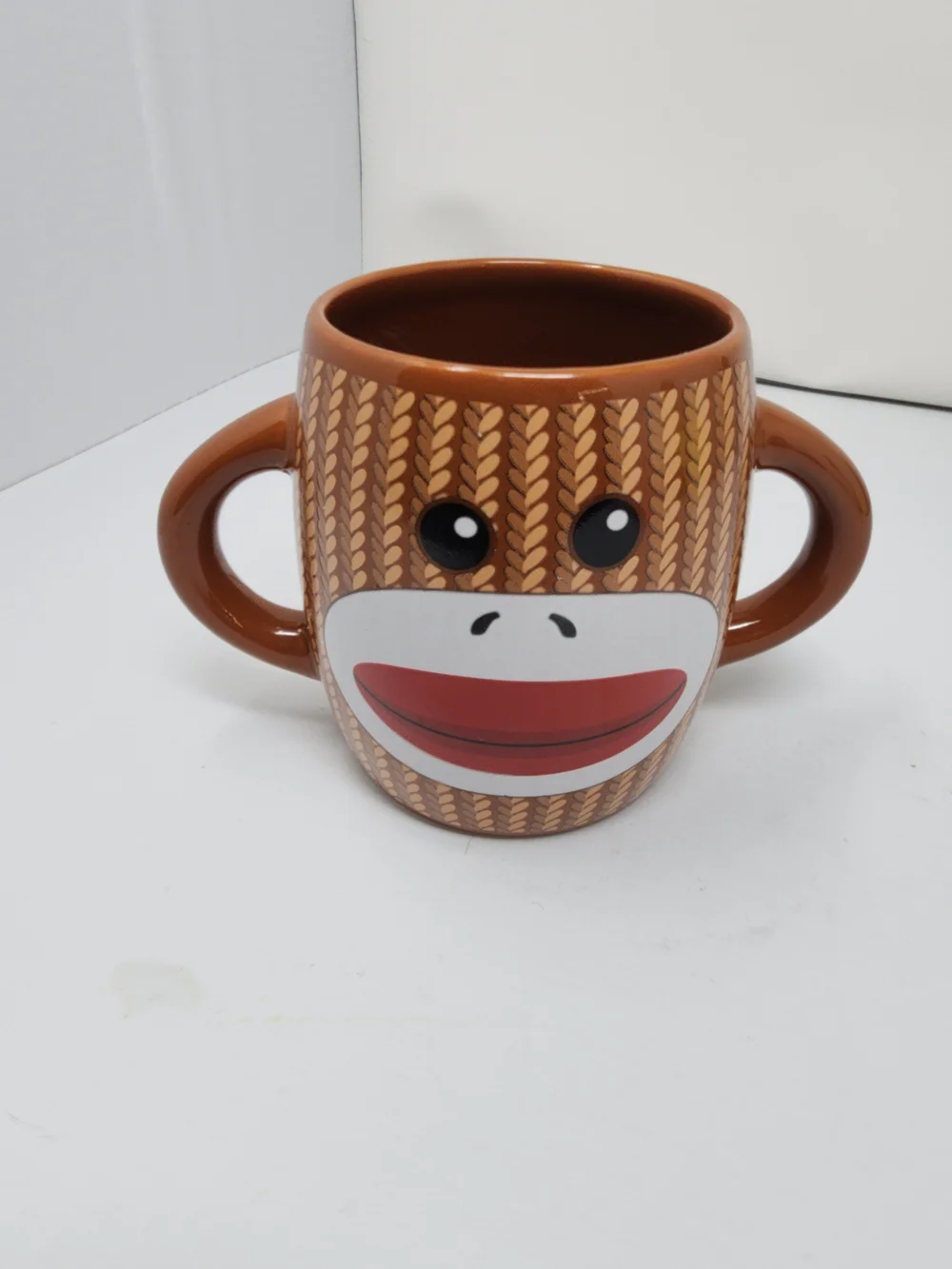 Playful Sock Monkey Double-Handle Ceramic Mug - Brown with Red Mouth